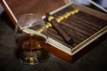 Large box of Cuban cigars on a wooden table Royalty Free Stock Photo