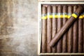 Large box of Cuban cigars on a wooden table Royalty Free Stock Photo