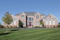 Large brick home with red door Royalty Free Stock Photo