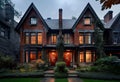 Large brick home with red door and large front yard. Royalty Free Stock Photo