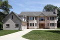 Large brick home with three car garage Royalty Free Stock Photo