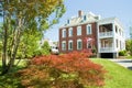 Large brick mansion with porch Royalty Free Stock Photo