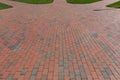 Large brick pathway splitting off into 3 different paths, choices of path to take, creative copy space Royalty Free Stock Photo