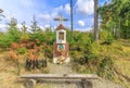 A large brick roadside shrine near StecÃ³wka in the Silesian Beskids (Poland)