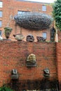 Large display of abstract designs, mostly stone faces on pedestals, American Visionary Art Museum, Baltimore, MD, 2017