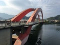 A large bridge spans across the river