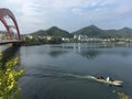 A large bridge spans across the river