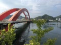 A large bridge spans across the river