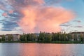 A large bright cloud at sunset over the pond Royalty Free Stock Photo