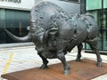 A large bronze bull sculpture at the intersection of Slovenska cesta & Trdinova ulica in Ljubljana, Slovenia.