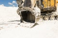 large bucket. old yellow excavator at a construction Royalty Free Stock Photo