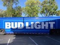 Large Bud Light sign on blue delivery truck parked at store parking lot - San Jose, California, USA - 2022