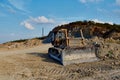 large bulldozer digging earth gravel and geology vehicle