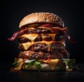 a large burger with bacon and cheese Royalty Free Stock Photo