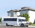 Large bus picking up from house Royalty Free Stock Photo