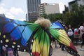 Large Butterfly Wings painting the streets of Mexico City with rainbow color in the LGBTTI pride march