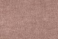 Large canvas knitted fabric from woolen threads with the right side