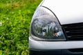 Large car headlights close-up, technical road lighting day and night Royalty Free Stock Photo