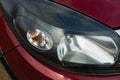 Large car headlights close-up, technical road lighting day and night. Royalty Free Stock Photo