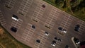 Large car park. There are few cars on it, a lot of free parking spaces. Aerial photography Royalty Free Stock Photo