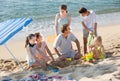 Large carefree family of six people on beach Royalty Free Stock Photo
