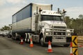 Large Cargo Haulage Truck Waits Turn To go Through Roadworks