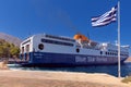 The large cargo and passenger ferry Blue Star moors to the pier of Symi Island