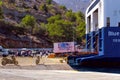 The large cargo and passenger ferry Blue Star moors to the pier of Symi Island