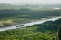 Large cargo ship navigating through the Panama Canal Royalty Free Stock Photo