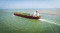 Large cargo ship sailing in the open waters of the Texas coast. Port Aransas, Corpus Christi Channel Royalty Free Stock Photo