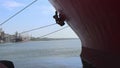 A large cargo ship stands at the pier in port waiting for loading by bulk cargo for transportation by sea