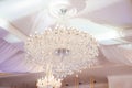 Large ceiling lamp, electric glass chandelier on the ceiling Royalty Free Stock Photo