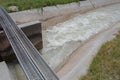 Large cement irrigation ditch with water flowing
