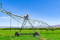 Large centre pivot irrigation system running on a farm in Canterbury, New Zealand