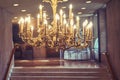Large chandelier in the lobby of a hotel or theater, close-up Royalty Free Stock Photo