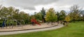 Large children playground area with slides, bars, swings and other equipment in Hazlehead park, Aberdeen, Scotland Royalty Free Stock Photo