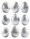 A large chocolate Easter egg wrapped in crinkled silver foil, isolated on white transparent background Royalty Free Stock Photo