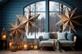 Large Christmas stars in the decor of the living room with a blue sofa