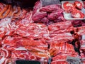 Large chunks of fresh steaks and other meat products Royalty Free Stock Photo