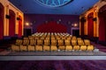 Large cinema theater with empty chair movie seats.