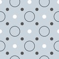 Large circles and small dot seamless repeat pattern. Hand-drawn dots and circles in different sizes on a light blue Royalty Free Stock Photo