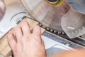 Large circular saw cuts a board in a carpenter workshop