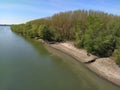 A large city drain drains sewage into a canal that flows into the river. Ecological problem. The concept of environmental Royalty Free Stock Photo