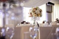 A large classic spherical composition from an assortment, beautiful flowers elegantly decorates the wedding dining table Royalty Free Stock Photo