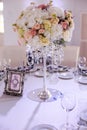 A large classic spherical composition from an assortment, beautiful flowers elegantly decorates the wedding dining table Royalty Free Stock Photo