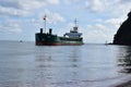 Large clay boat entering the Teign Estuary into Teignmouth Docks