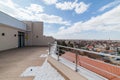 Large clean balcony with tiles and stones city view from the balcony