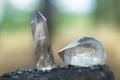 Large clear pure transparent great royal crystal of quartz chalcedony diamond brilliant on nature blurred bokeh background closeup