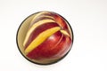 Chopped red apple on white surface Royalty Free Stock Photo