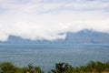 large cloud over mountain shore of Lake Sevan Royalty Free Stock Photo